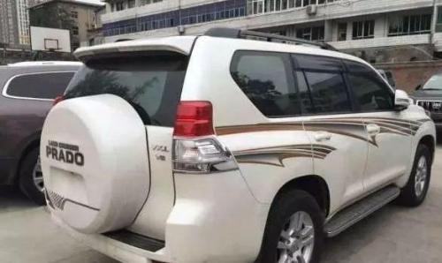 What do suffixes TX, TXL, VX, VXL mean on Toyota Prado...